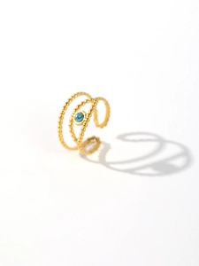 Detail of gold beaded layered ring with turquoise stone and adjustable open band