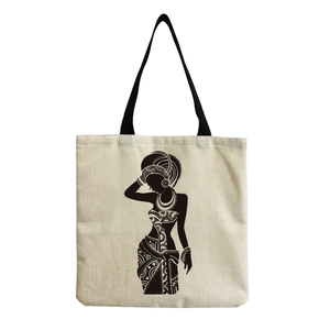 Detail of eco-friendly canvas tote bag with black African woman art print and sturdy strap