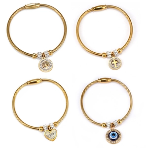 Gold-plated snake chain bracelet set with crystal tree of life and evil eye charms