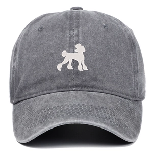 Close-up of white poodle embroidery on dark grey washed cotton baseball cap