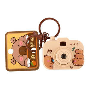 Cute Capybara mini camera keychain with glowing effect and illustrated backing card