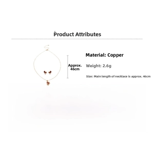 Detail showing gold-plated copper necklace and earrings set with bow design and dimensions