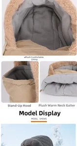 Detail of soft fleece lining and integrated mask on khaki winter trapper hat