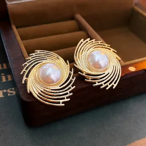 Vintage gold spiral pearl stud earrings for women with elegant retro jewelry design