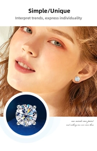 Close-up of D color moissanite stud earrings with a 4-claw 925 silver setting