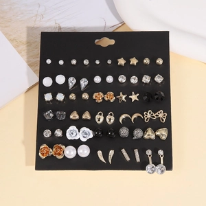 36-pair set of assorted geometric stud earrings with pearls and crystals on black card