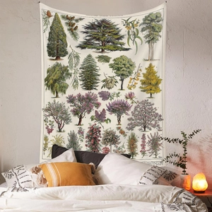 Close-up of vintage botanical tapestry hanging over a cozy bed with warm lighting