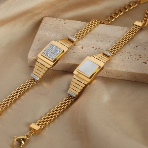 Bracelets vintage dorés avec breloques carrées en diamant et nacre sur pierre