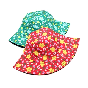 Floral reversible bucket hat for men and women in red and green cotton for sun protection