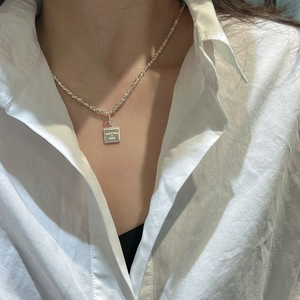S925 sterling silver necklace featuring a square pendant engraved with ME YOU love text