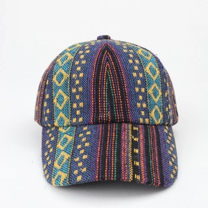 Detailed close-up of bohemian style baseball cap featuring ethnic geometric woven patterns