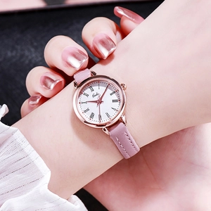 Elegant women's quartz watch with pink leather strap and rose gold round dial
