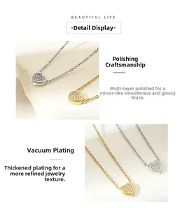 Detail of heart necklace showing polished mirror finish and vacuum plating in gold and silver