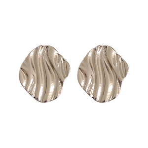 Modern silver irregular water ripple stud earrings with liquid metal texture for women