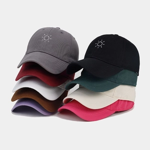 Detailed grid of baseball caps featuring sun embroidery in multiple vibrant colors