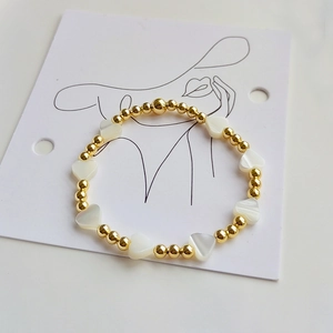 18K gold-plated beaded elastic bracelet featuring natural shell heart charms for women