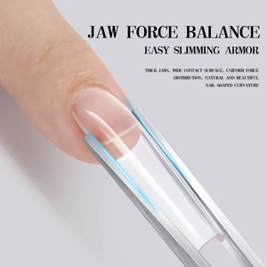 Macro detail of stainless steel nail shaping tool with wide jaws on clear nail tips