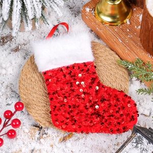 Sparkling red sequin Christmas stocking with white faux fur cuff and hanging loop