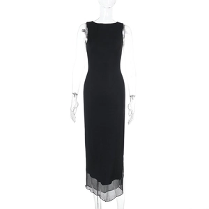 Detail of black slim sleeveless dress featuring semi-transparent layered mesh hemline
