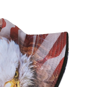 Macro detail of bucket hat showing eagle print, US flag colors, and reinforced stitching