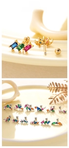 Vue détaillée de boucles d'oreilles en zircon coloré avec fermoir à vis et base métallique