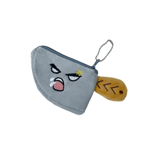 Quirky plush meat cleaver coin purse with gray blade and brown handle on white background