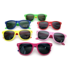 Detail of colorful kids sunglasses set with UV400 lenses in six vibrant frames