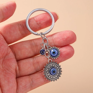 Retro hip-hop sun and evil eye keychain with blue resin pendants and silver metal link