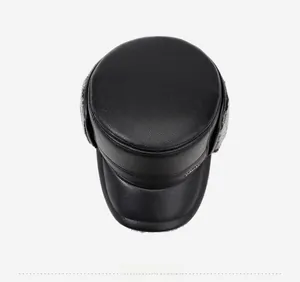 Top view of men's leather winter hat with ear flaps and warm grey faux fur lining