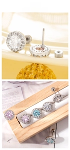 Macro detail of cubic zirconia screw-back stud earrings in multi-color pastel tones
