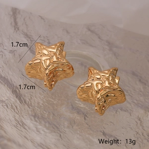 Detail showing gold star earrings with lava wrinkle texture, 1.7cm size and 13g weight