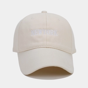 Close-up of NEW YORK embroidery on cotton canvas baseball cap with dense stitching