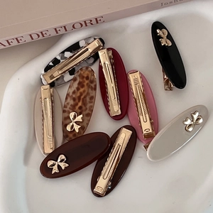 Elegant oval resin hair clips with marble patterns and gold metal beak clips set