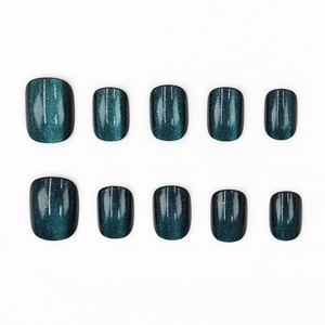 Peacock blue cat-eye press-on nails with shimmering magnetic effect and short square shape
