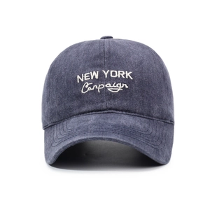 Retro washed navy blue baseball cap featuring white New York Campaign embroidery