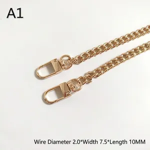 Detail of 2.0mm gold metal bag chain with lobster clasps for luxury bag modification