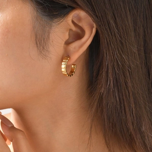 Minimalist gold-plated stainless steel double twisted hoop earrings with wave texture