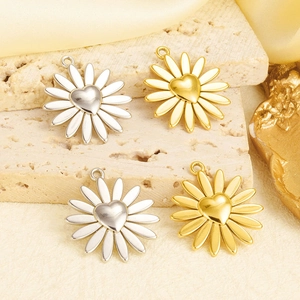 Detailed view of silver and gold sun flower heart pendants in 304 stainless steel