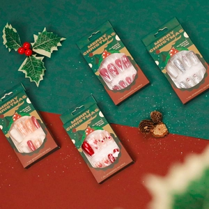 Christmas theme soft gel press-on nails set with red snowflake and glitter rhinestone designs