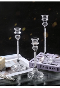Detailed view of three-piece diamond glass candle holders with crystal diamond filling