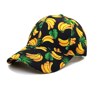 Detail of the six-panel construction and curved brim with tropical banana leaf print