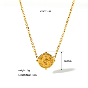 Detail view of 15.8mm Evil Eye gold pendant with specific size and weight parameters