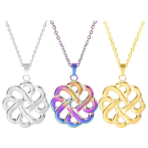Detailed view of Celtic witch knot heart pendants in silver, gold, and rainbow finishes