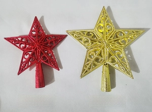 Detail view of floral hollow red and gold Christmas tree topper stars in small and large sizes