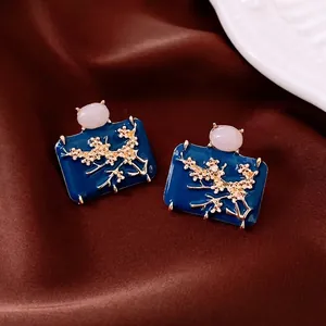 Vintage blue enamel quadrilateral earrings with golden plum blossoms and oval gemstones