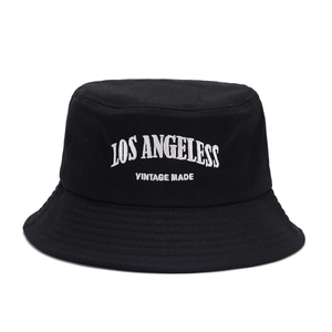 Black cotton bucket hat with vintage Los Angeles embroidery on a white background