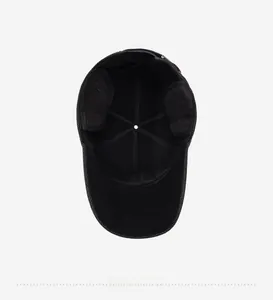 Detail view of thickened warm ear flaps and reinforced inner stitching of winter baseball cap