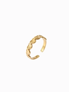 Detailed close-up of 18k gold plated adjustable ring with a series of solid heart patterns