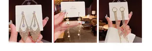Three elegant geometric tassel earrings featuring crystals and pearls on S925 silver pins