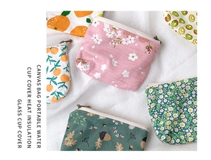 Detail of floral printed canvas cup covers with various botanical patterns and patterns